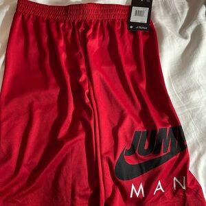 BRAND NEW TAGS ON size Youth XL Nike jump man (shorts) - red